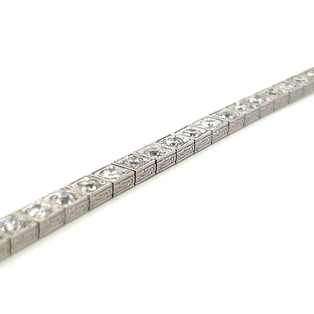Vintage Platinum Tennis Bracelet with 6.94 Carat Old European H VS Diamonds