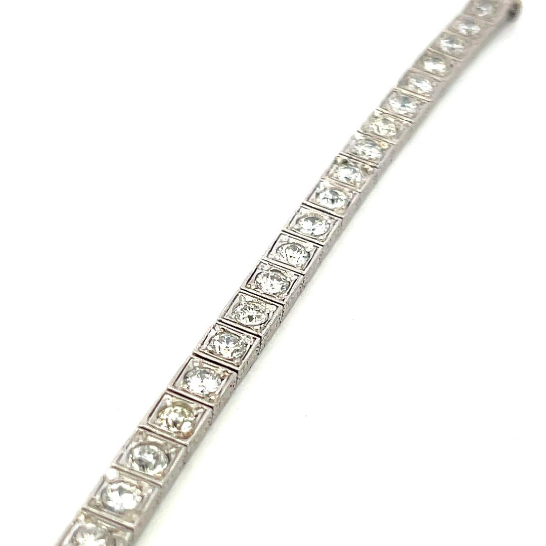 Vintage Platinum Tennis Bracelet with 6.94 Carat Old European H VS Diamonds