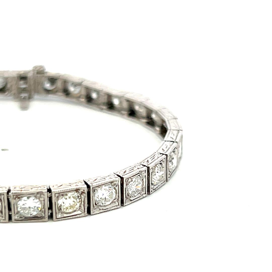 Vintage Platinum Tennis Bracelet with 6.94 Carat Old European H VS Diamonds