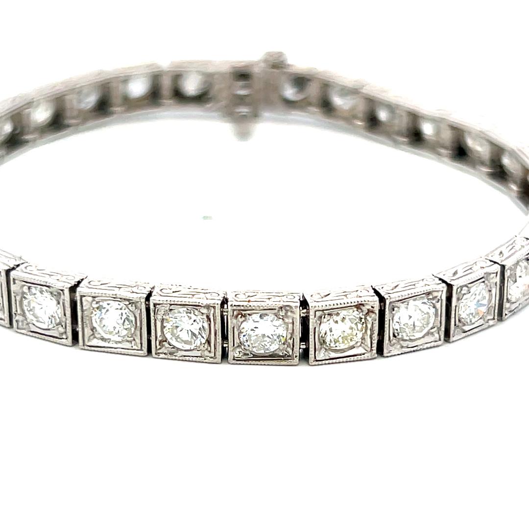 Vintage Platinum Tennis Bracelet with 6.94 Carat Old European H VS Diamonds