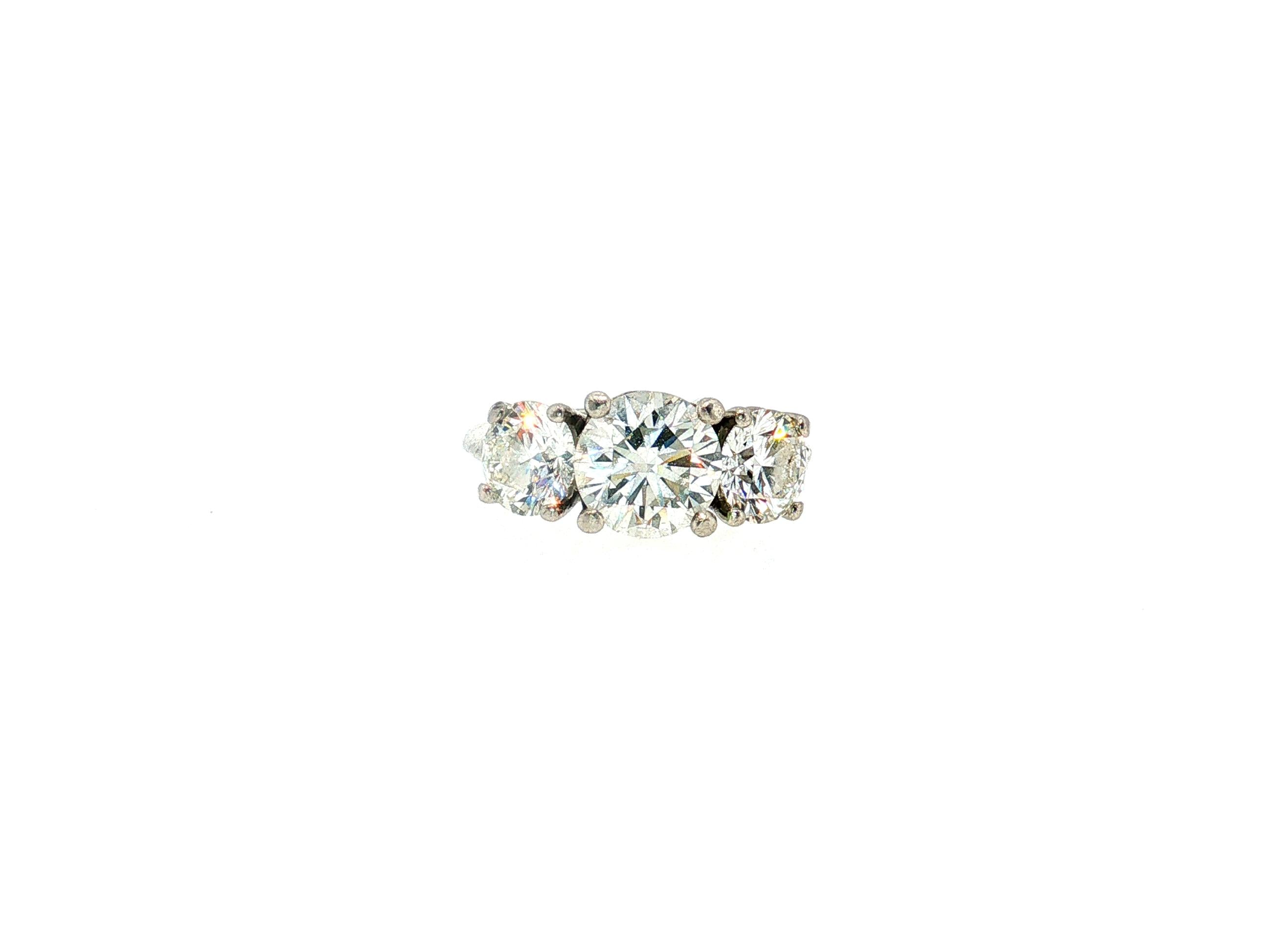 Tiffany & Co Platinum Three-Stone Ring with 4.56 Carat Round Diamonds Size 5