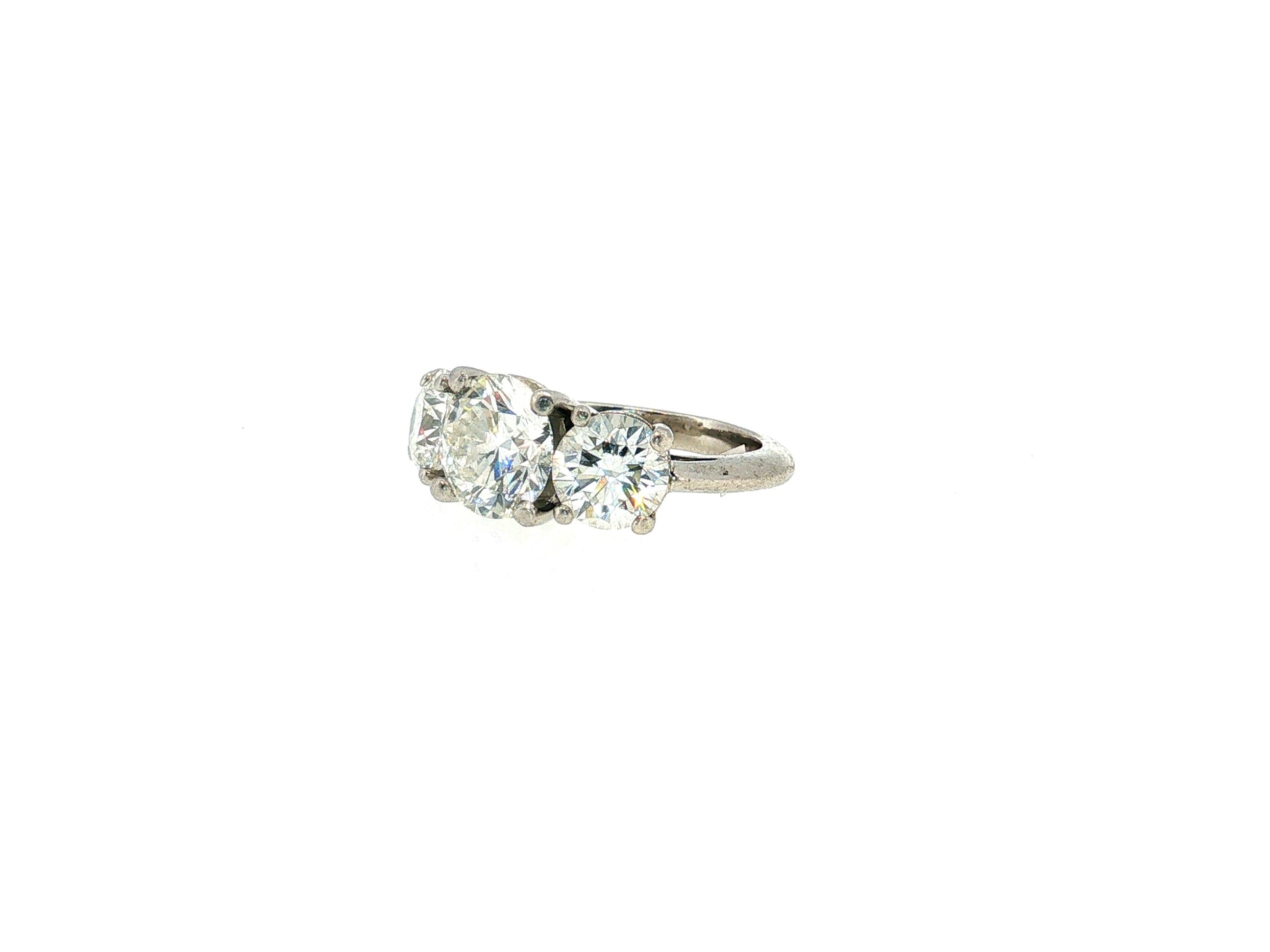 Tiffany & Co Platinum Three-Stone Ring with 4.56 Carat Round Diamonds Size 5