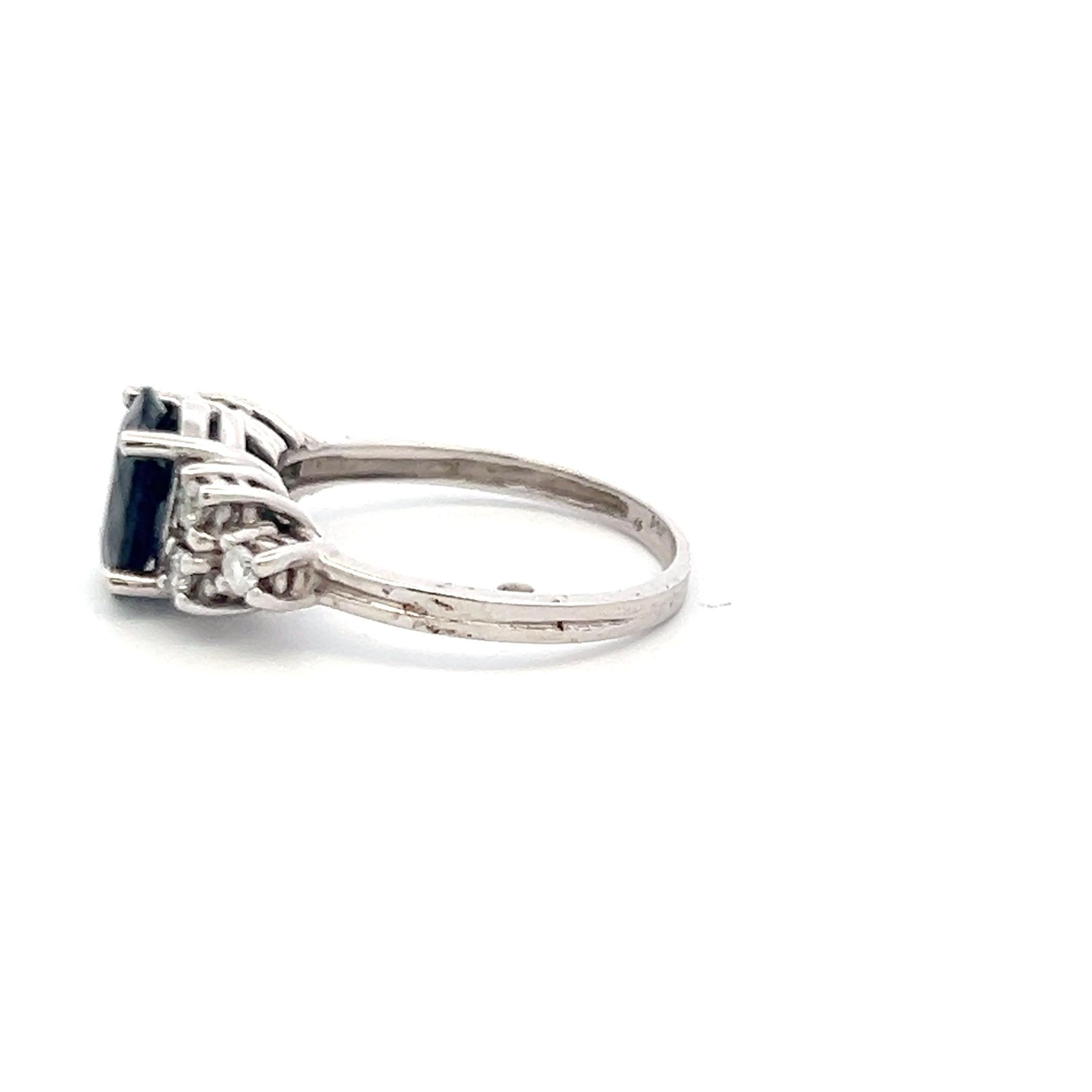 14K WG Engagement Ring with 0.3 Carat Round Diamonds & 2 Carat Sapphire