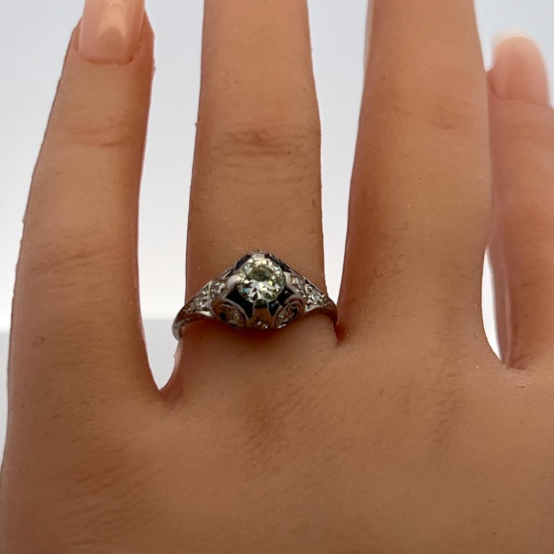 Antique Platinum Filigree Ring with 0.93 Carat Diamonds & 0.16 Carat Sapphire