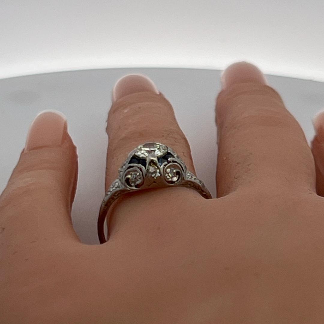 Antique Platinum Filigree Ring with 0.93 Carat Diamonds & 0.16 Carat Sapphire