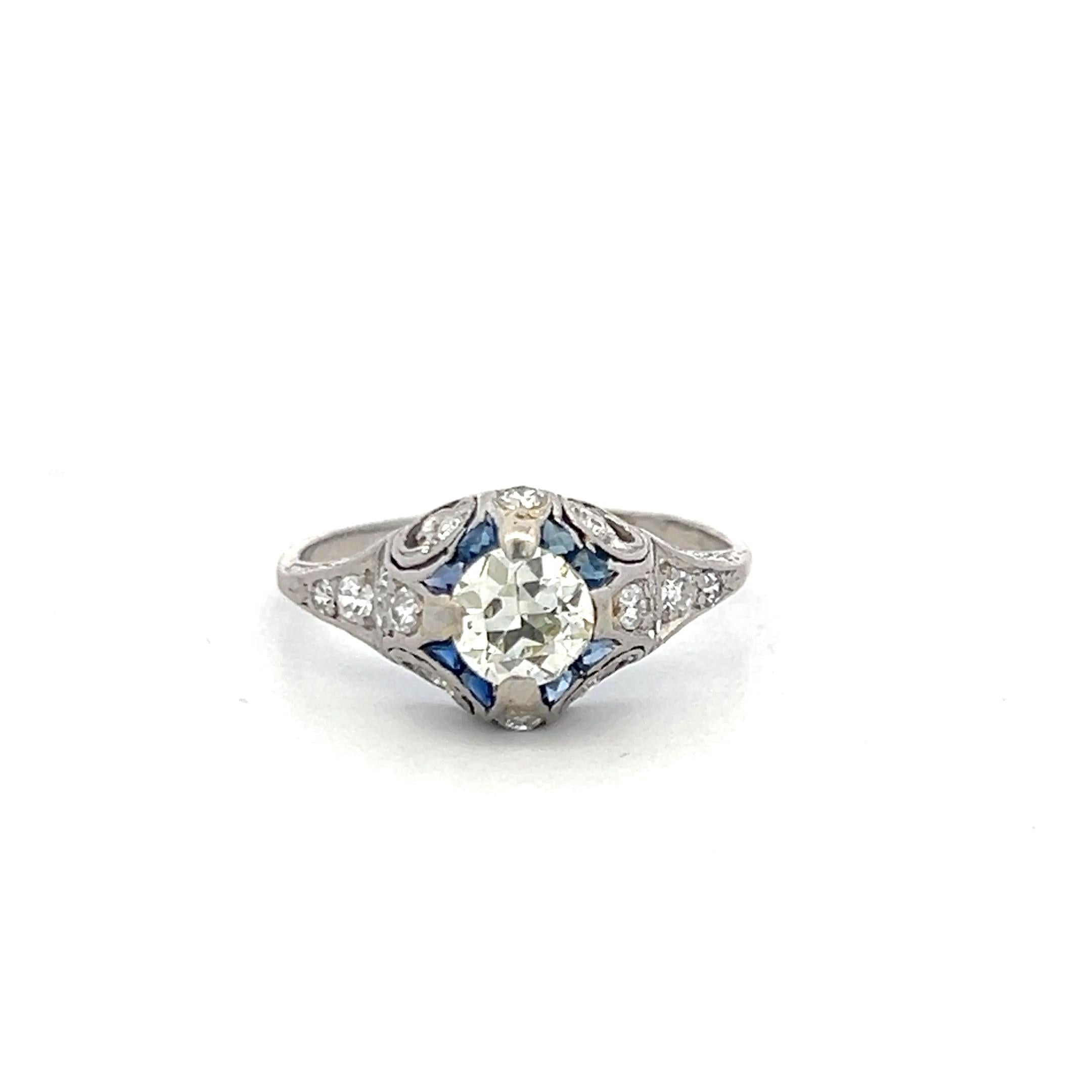 Antique Platinum Filigree Ring with 0.93 Carat Diamonds & 0.16 Carat Sapphire
