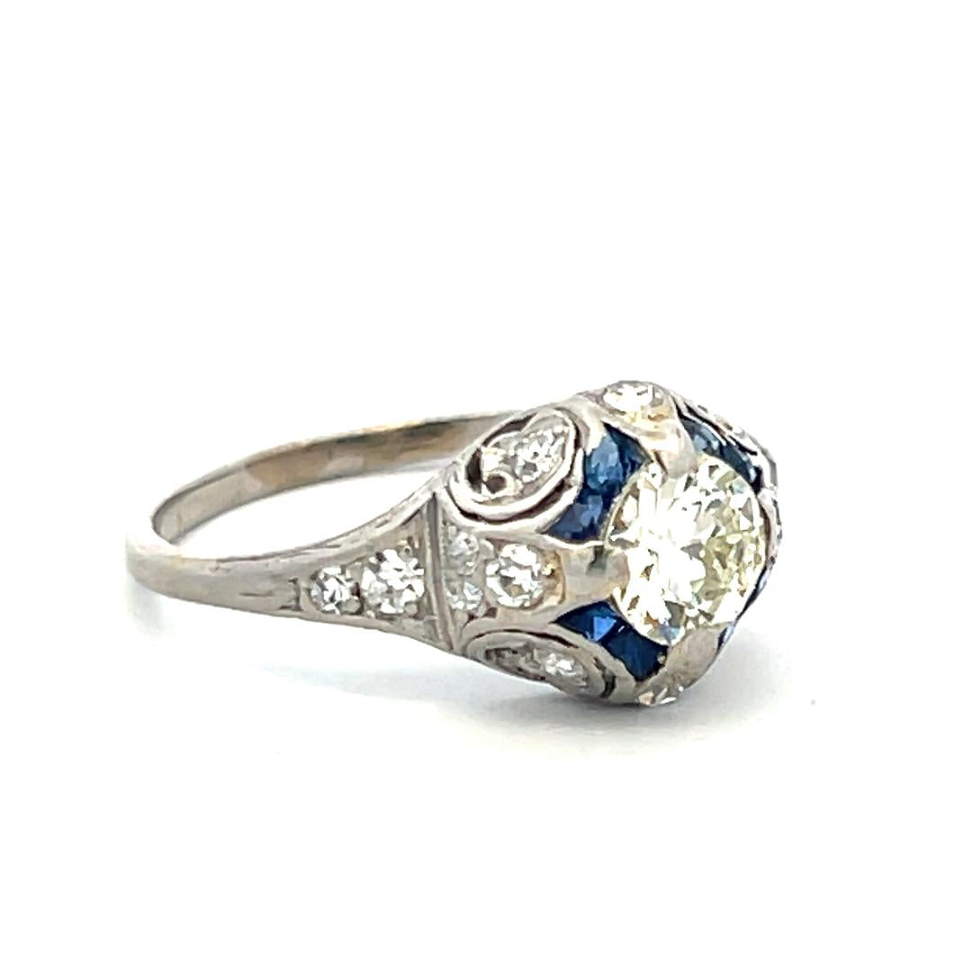 Antique Platinum Filigree Ring with 0.93 Carat Diamonds & 0.16 Carat Sapphire