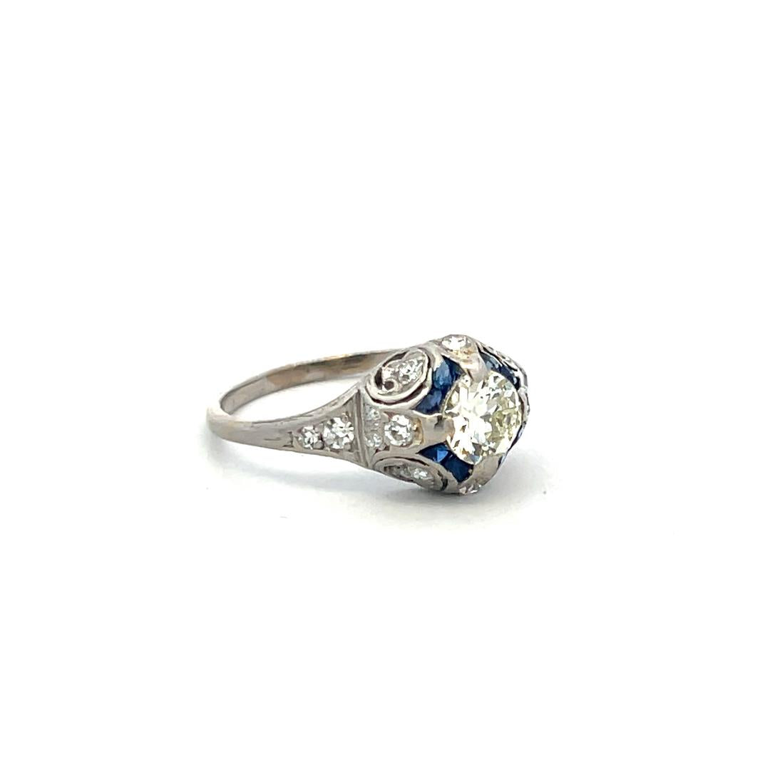 Antique Platinum Filigree Ring with 0.93 Carat Diamonds & 0.16 Carat Sapphire