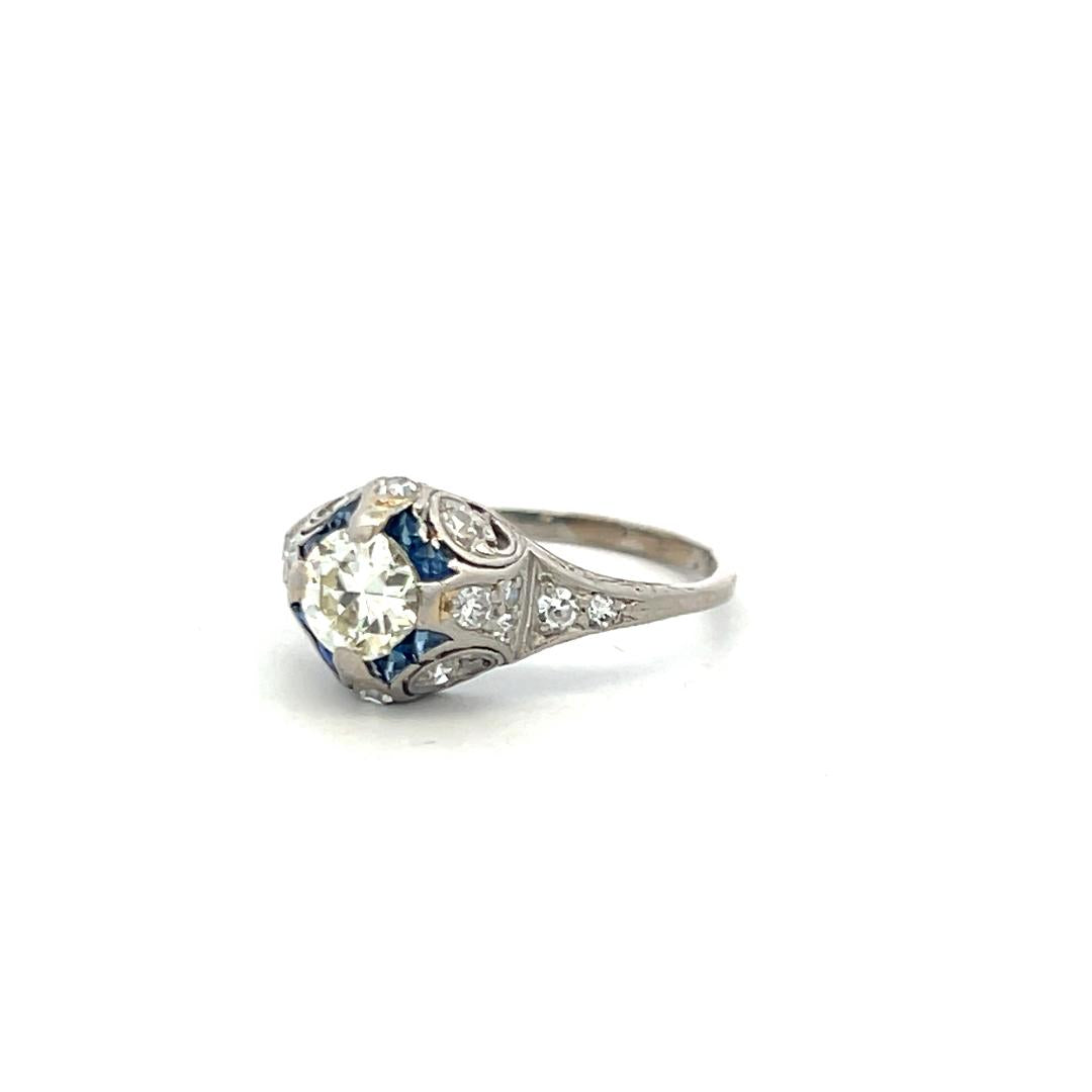 Antique Platinum Filigree Ring with 0.93 Carat Diamonds & 0.16 Carat Sapphire
