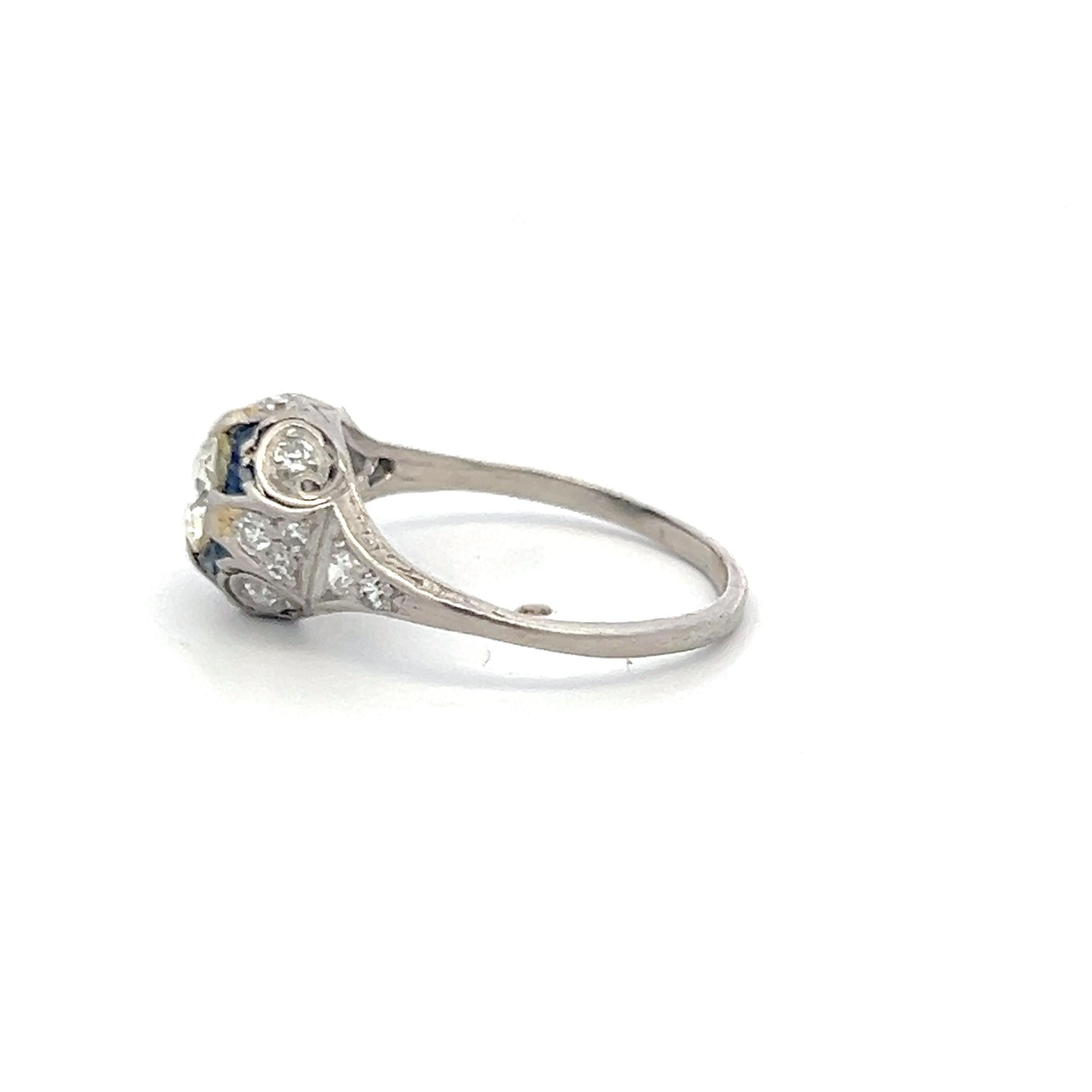 Antique Platinum Filigree Ring with 0.93 Carat Diamonds & 0.16 Carat Sapphire