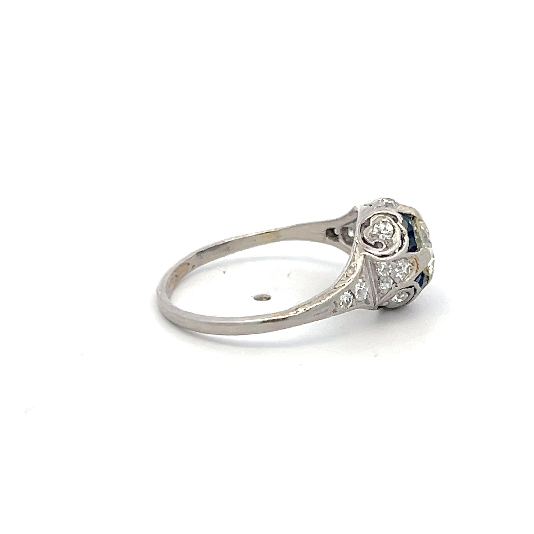 Antique Platinum Filigree Ring with 0.93 Carat Diamonds & 0.16 Carat Sapphire