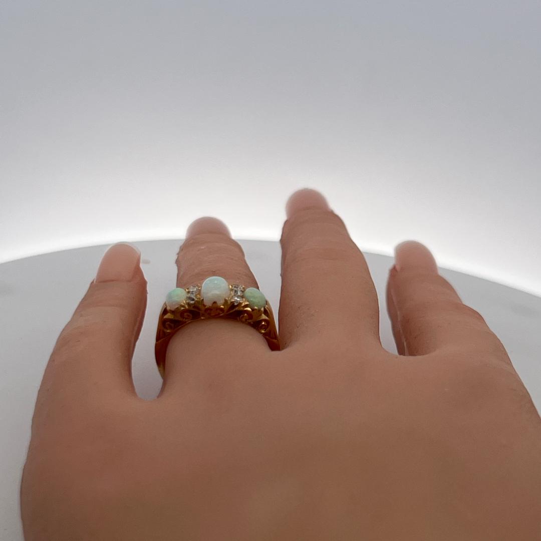 18K YG Three-Stone Ring with 0.12 Carat Diamonds & (4.9-7.5)x(3.9-4.3) MM Opal