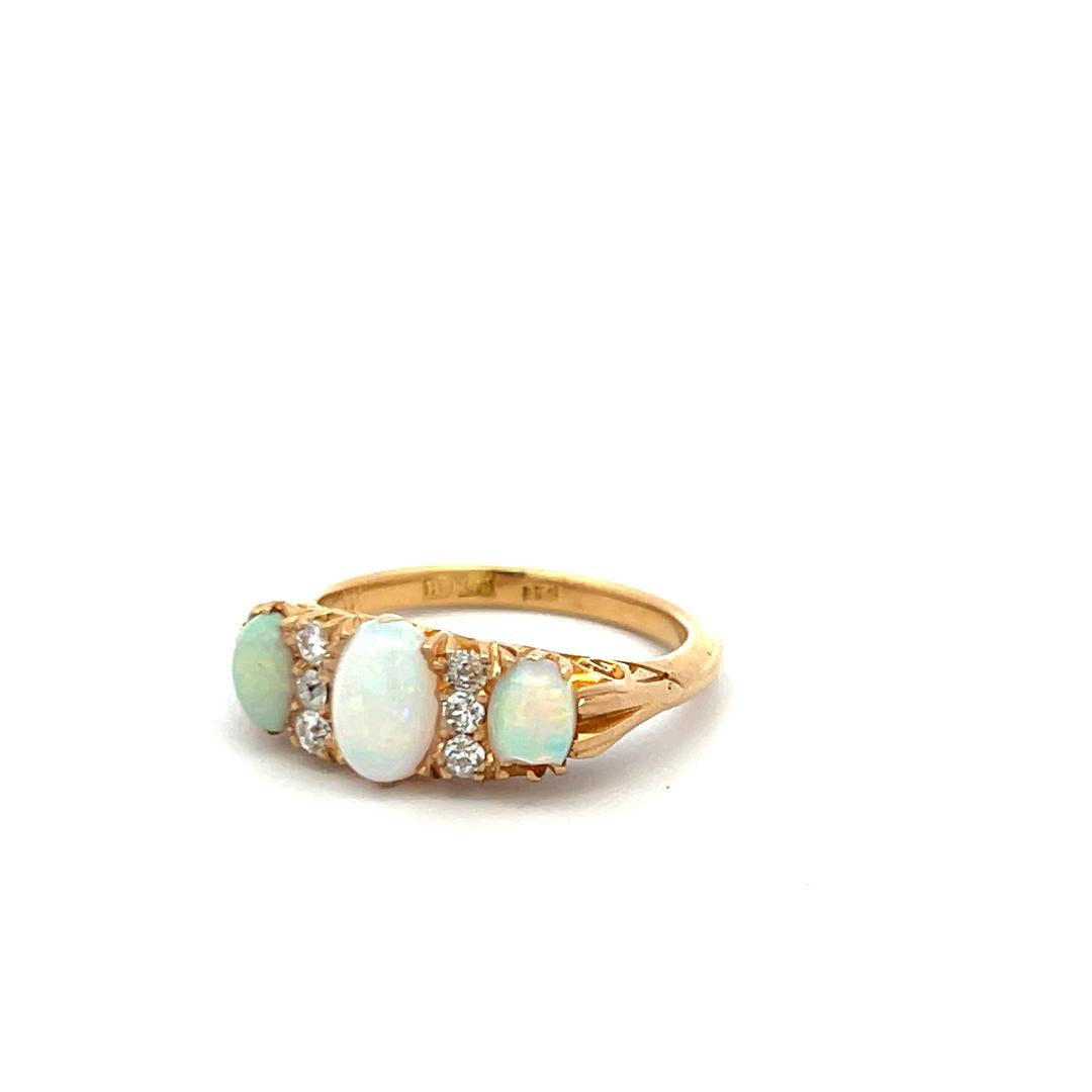 18K YG Three-Stone Ring with 0.12 Carat Diamonds & (4.9-7.5)x(3.9-4.3) MM Opal
