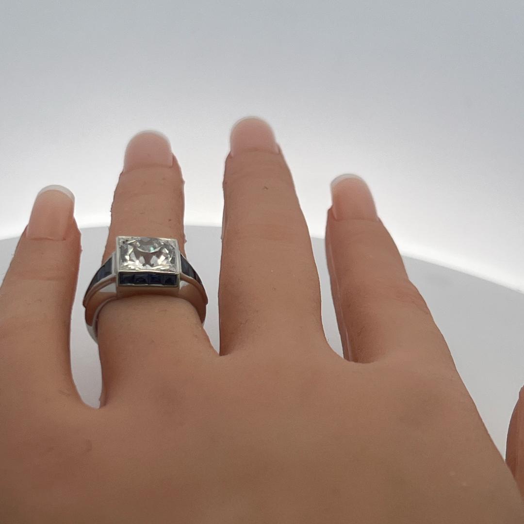 Platinum Engagement Ring with 3.92 Ct. Old Miner GIA Diamond & 1.04 Ct. Sapphire