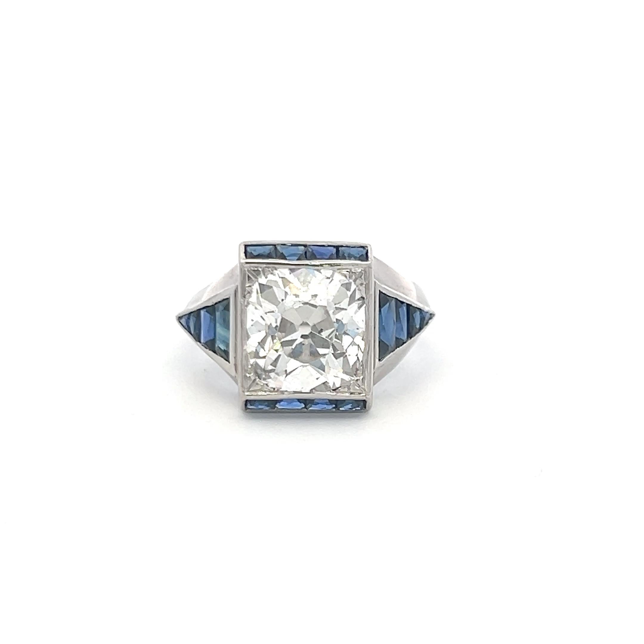 Platinum Engagement Ring with 3.92 Ct. Old Miner GIA Diamond & 1.04 Ct. Sapphire