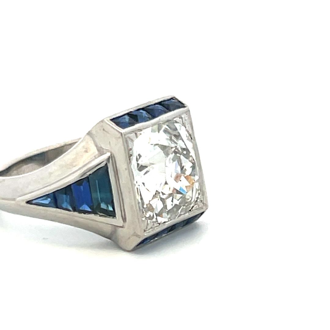 Platinum Engagement Ring with 3.92 Ct. Old Miner GIA Diamond & 1.04 Ct. Sapphire