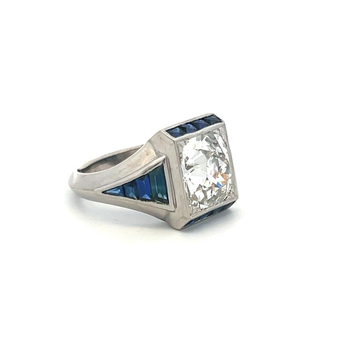 Platinum Engagement Ring with 3.92 Ct. Old Miner GIA Diamond & 1.04 Ct. Sapphire