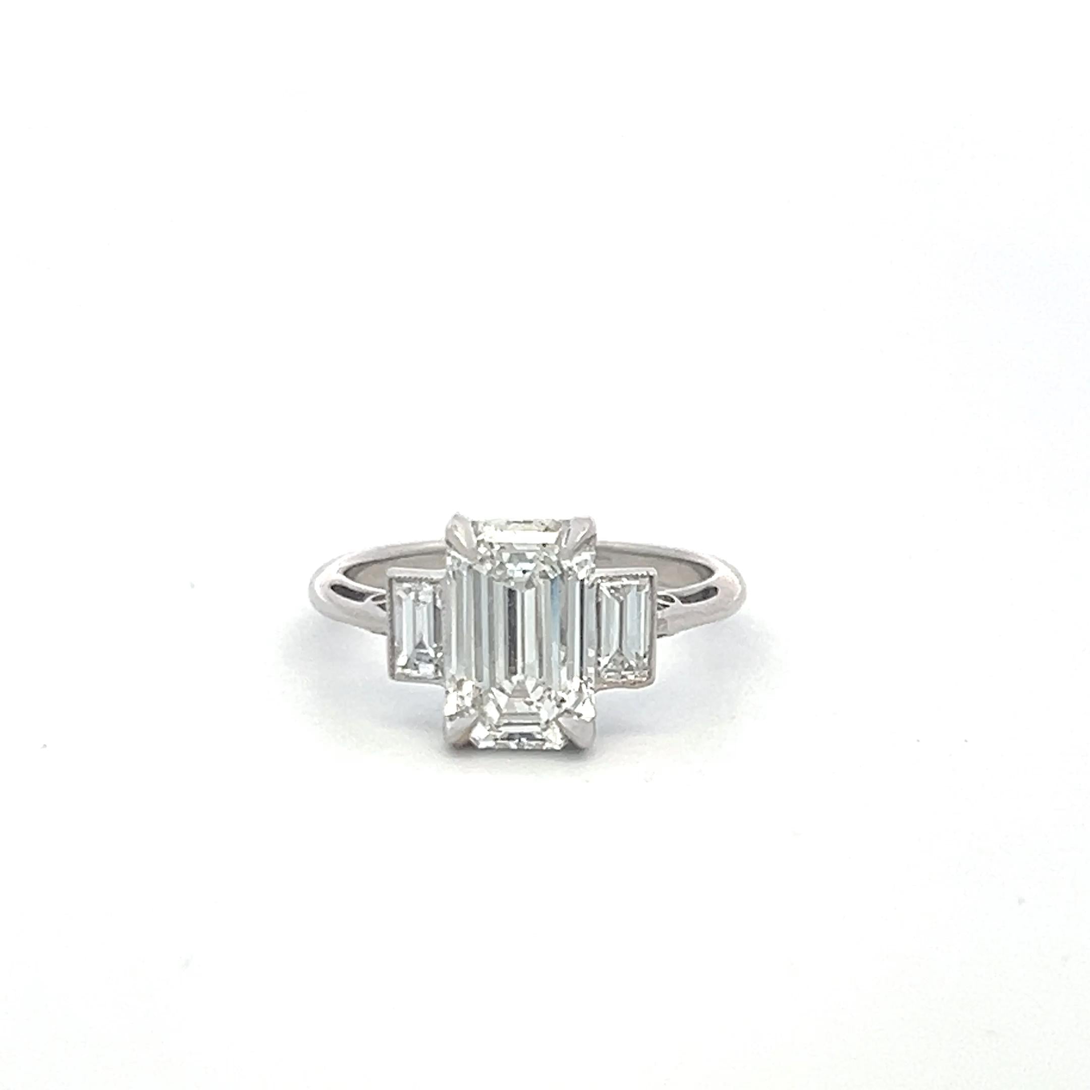 Platinum Three Stone Engagement Ring with 2.06 Carat Emerald Cut GIA Diamonds