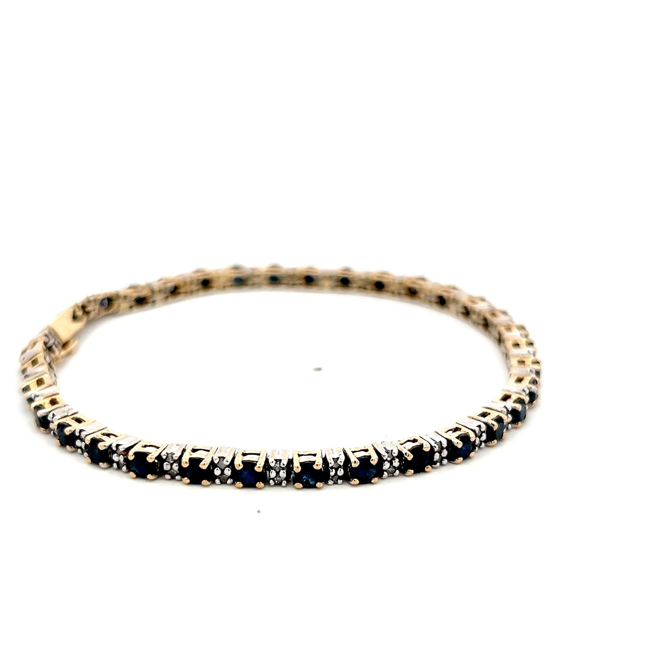 14K Two Tone Gold Tennis Bracelet with 0.68 Carat Diamonds & 4.08 Carat Sapphire