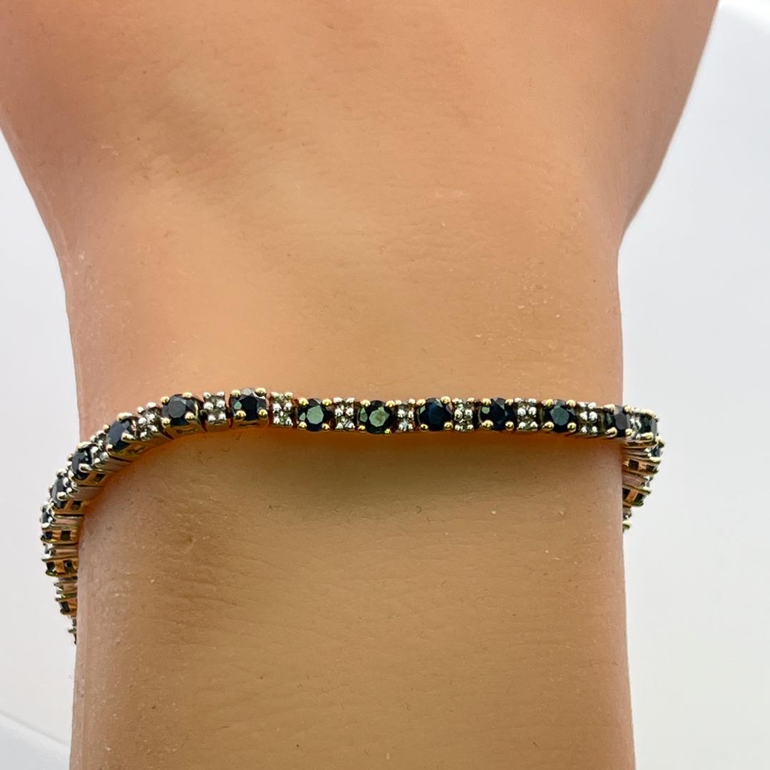 14K Two Tone Gold Tennis Bracelet with 0.68 Carat Diamonds & 4.08 Carat Sapphire