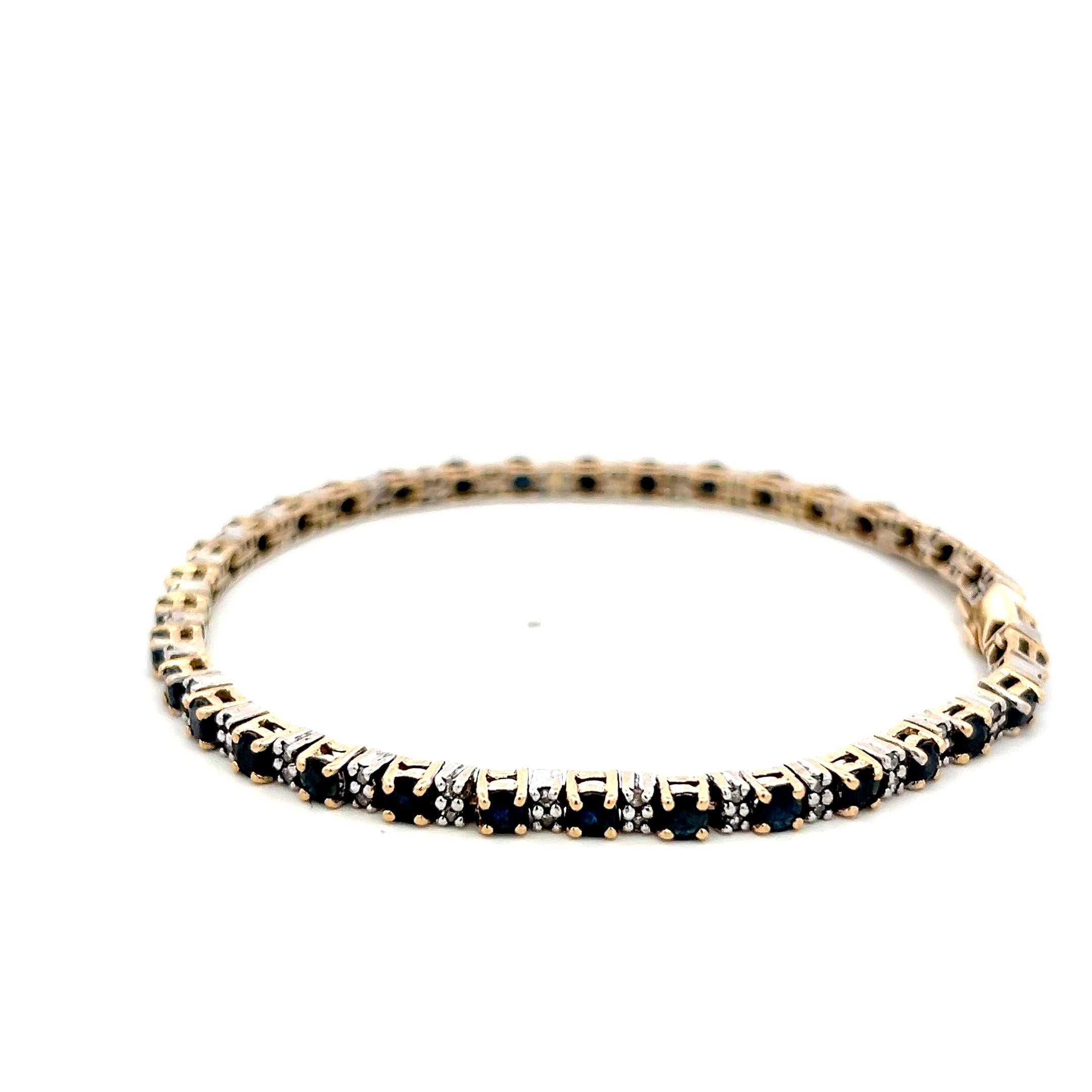 14K Two Tone Gold Tennis Bracelet with 0.68 Carat Diamonds & 4.08 Carat Sapphire