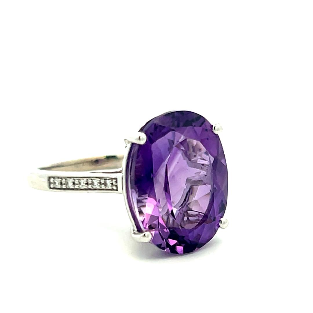14K WG Cocktail Ring with 0.05 Ct Round Diamond & 9.11 Ct Oval Amethyst Size 7.5