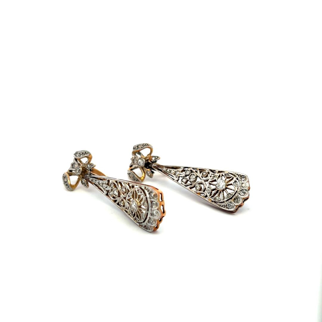 Antique 18K Yellow Gold Dangling Earrings with 0.65 Carat Round I-VS Diamonds