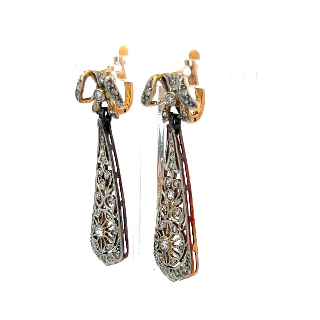 Antique 18K Yellow Gold Dangling Earrings with 0.65 Carat Round I-VS Diamonds