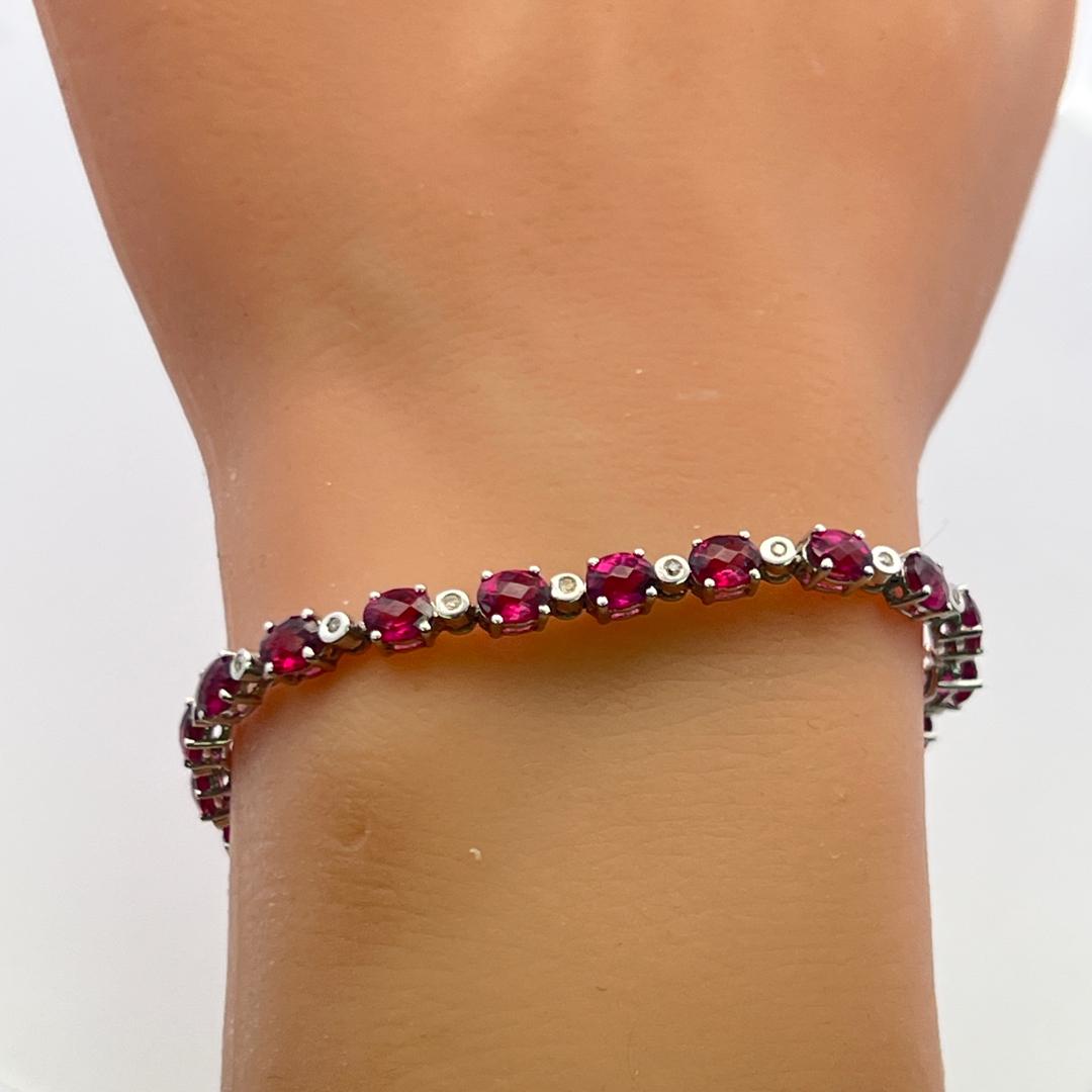18K WG Tennis Bracelet with 0.18 Carat Round I-SI Diamonds & 10.6 Carat Garnet