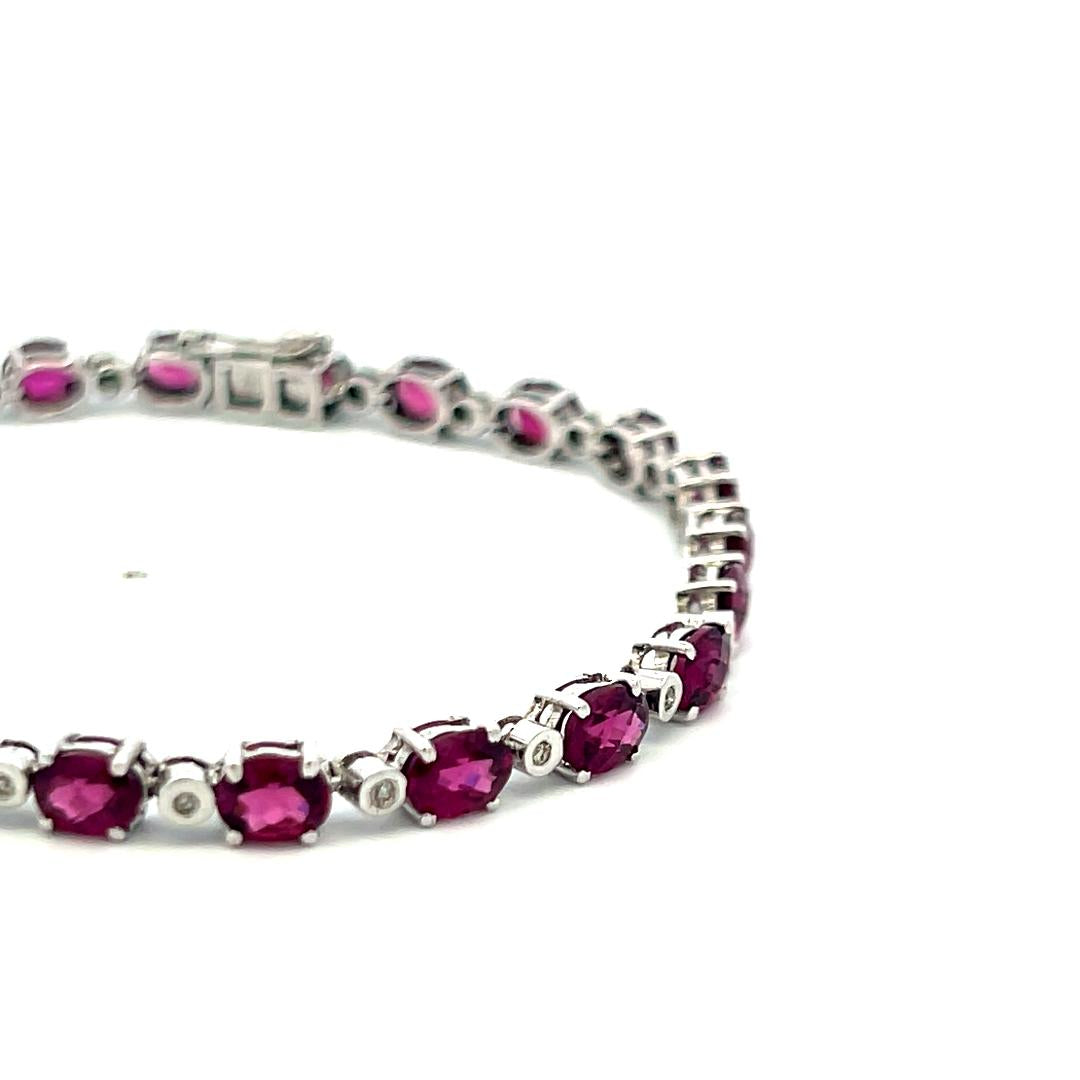 18K WG Tennis Bracelet with 0.18 Carat Round I-SI Diamonds & 10.6 Carat Garnet