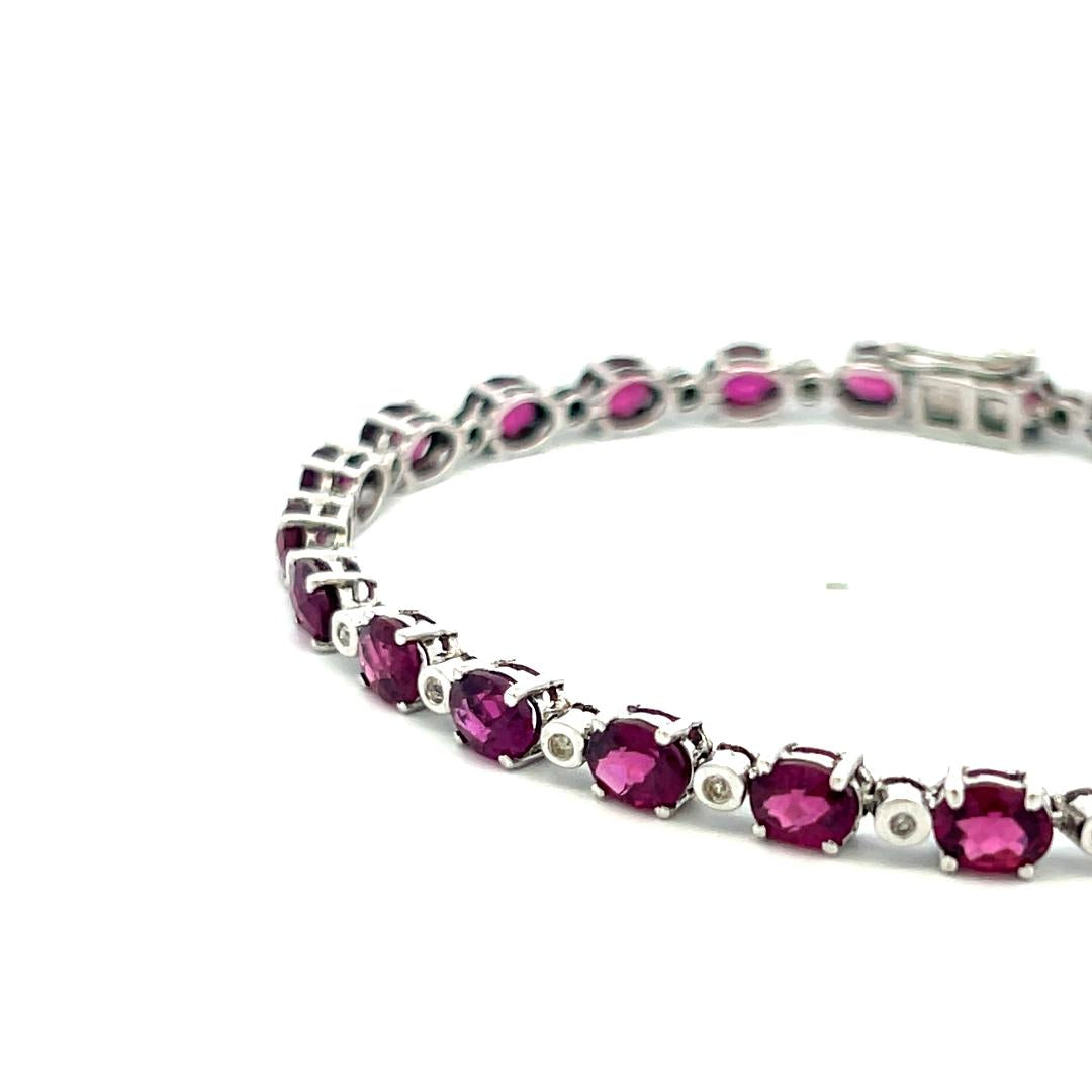 18K WG Tennis Bracelet with 0.18 Carat Round I-SI Diamonds & 10.6 Carat Garnet