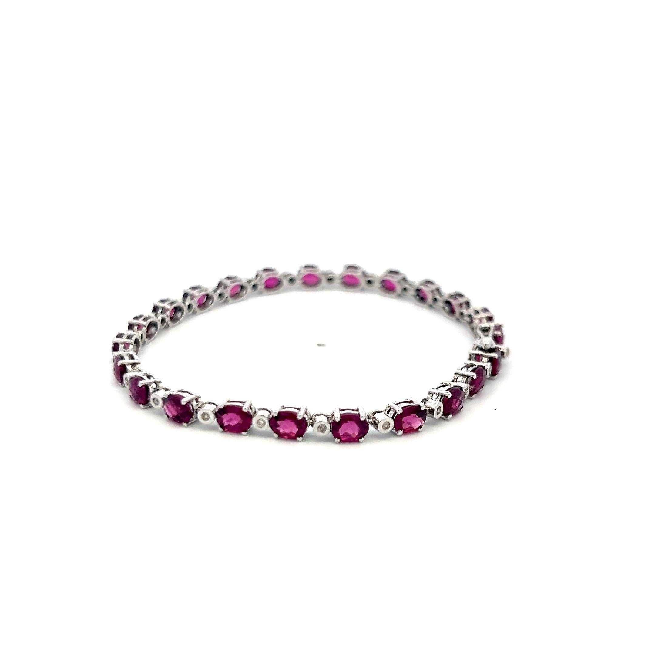 18K WG Tennis Bracelet with 0.18 Carat Round I-SI Diamonds & 10.6 Carat Garnet