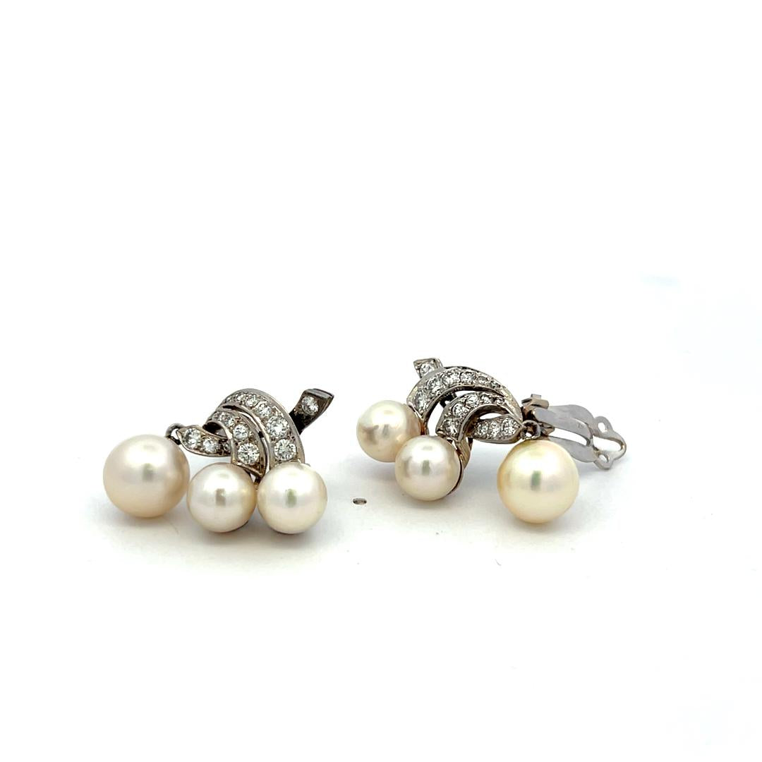 14K WG Clip-On Earrings with 0.83 Carat Round Diamonds & 7.50 - 9.00 MM Pearl