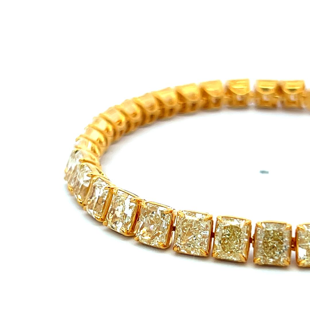 18K Yellow Gold Tennis Bracelet 22.21 Carat Radiant Cut Fancy Yellow Diamonds