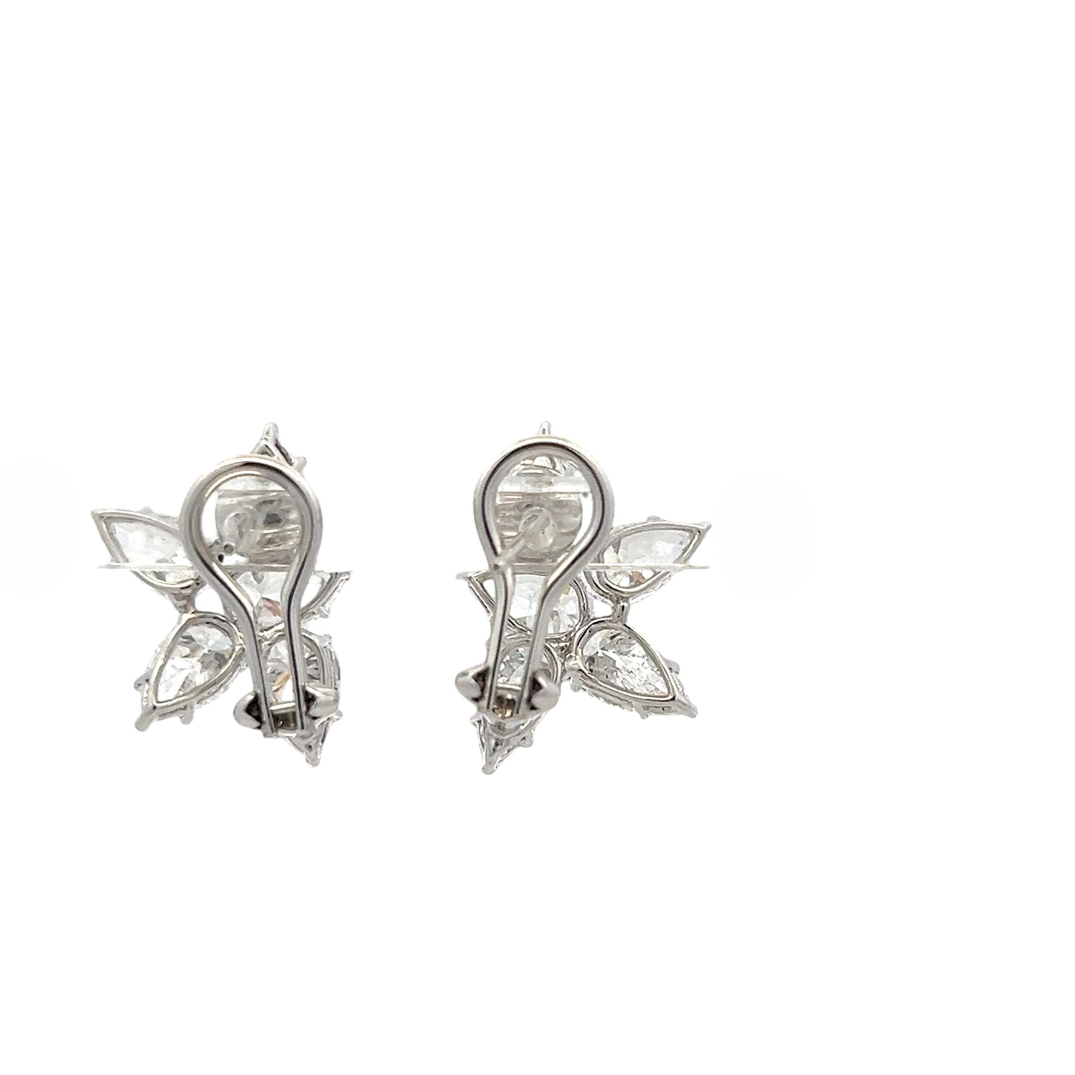 18K White Gold Diamond Clip-On Earrings with 7.03 Carat Pear Shaped Diamonds GIA
