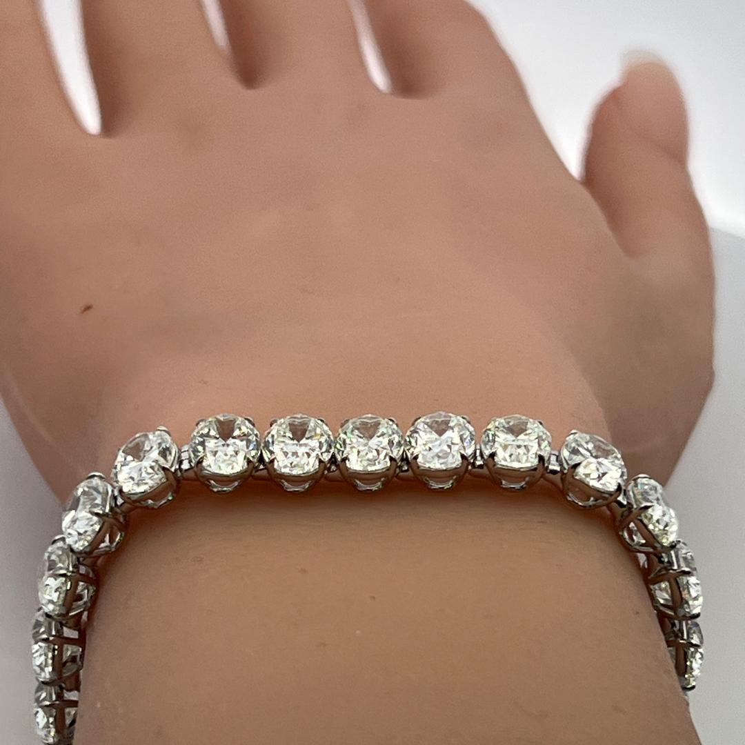 Vintage 18K White Gold Tennis Bracelet with 42.19 Carat Oval Shape Diamonds GIA