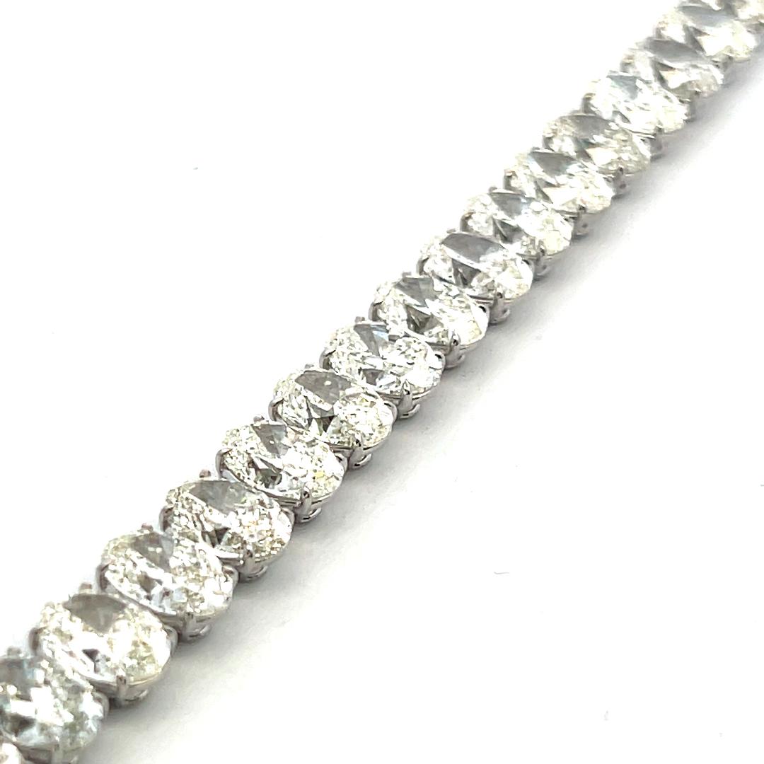 Vintage 18K White Gold Tennis Bracelet with 42.19 Carat Oval Shape Diamonds GIA