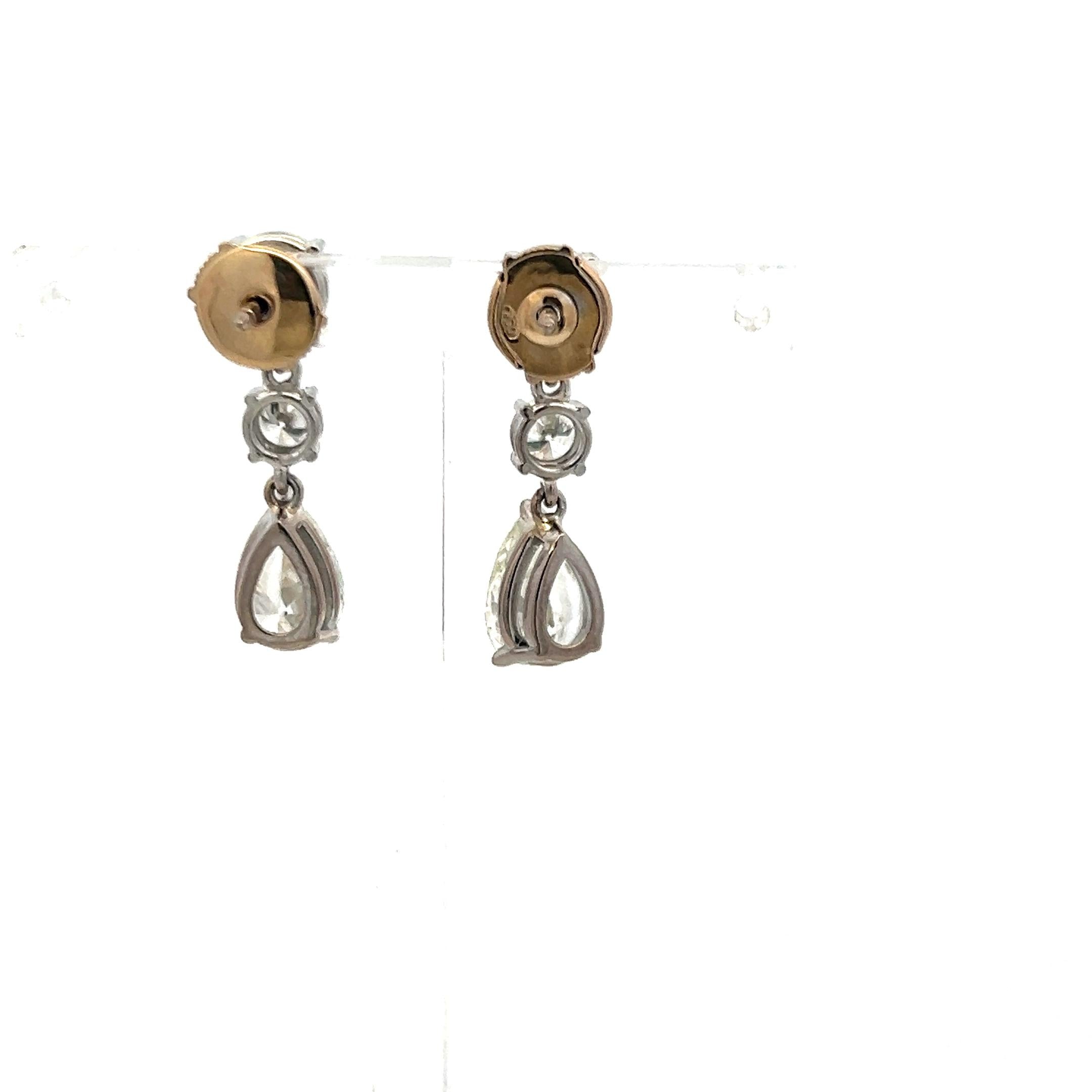 Vintage 5.62 Carat Pear And Round Diamonds 18 Karat White Gold Drop Earrings