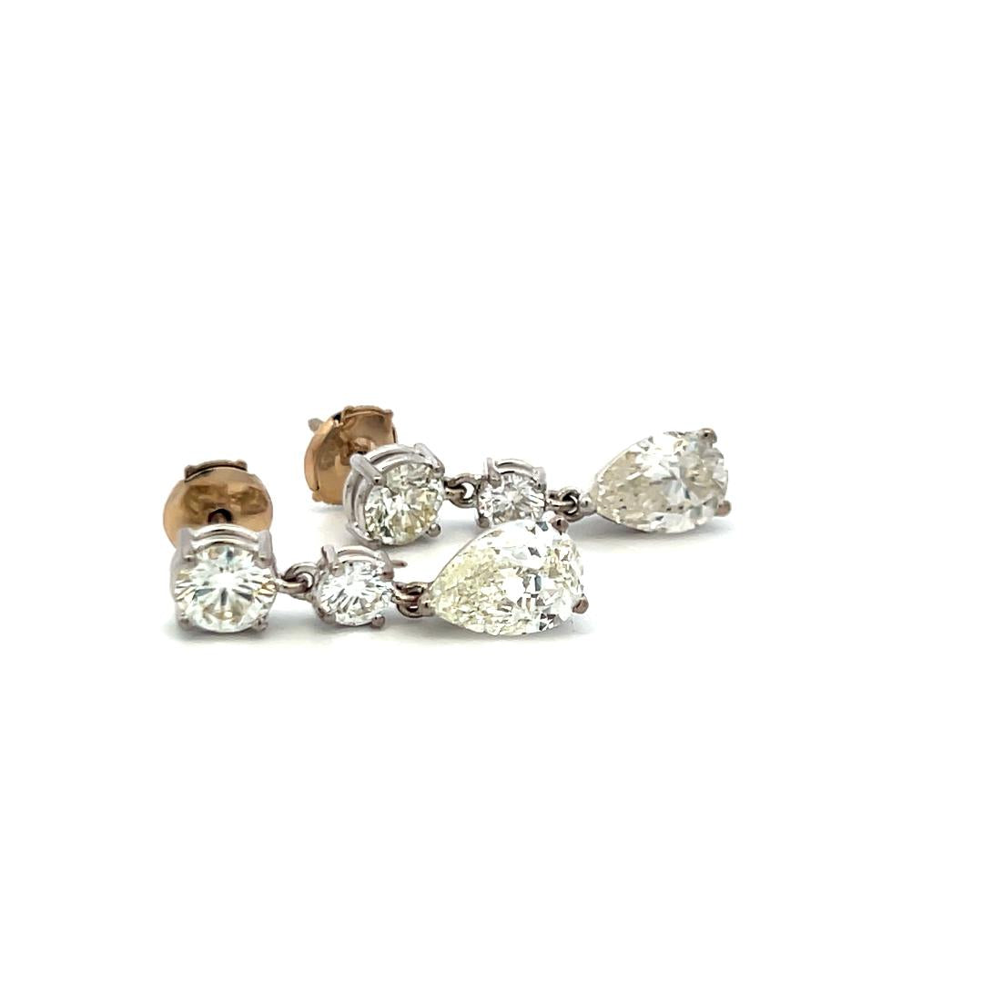 Vintage 5.62 Carat Pear And Round Diamonds 18 Karat White Gold Drop Earrings