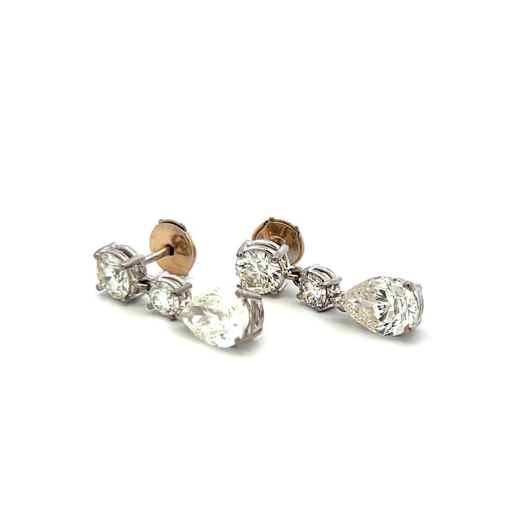 Vintage 5.62 Carat Pear And Round Diamonds 18 Karat White Gold Drop Earrings