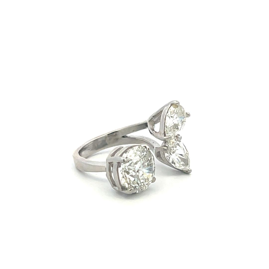 Estate Platinum Three-Stone Cocktail Ring with 3.62 Ct Round & Pear Diamonds GIA