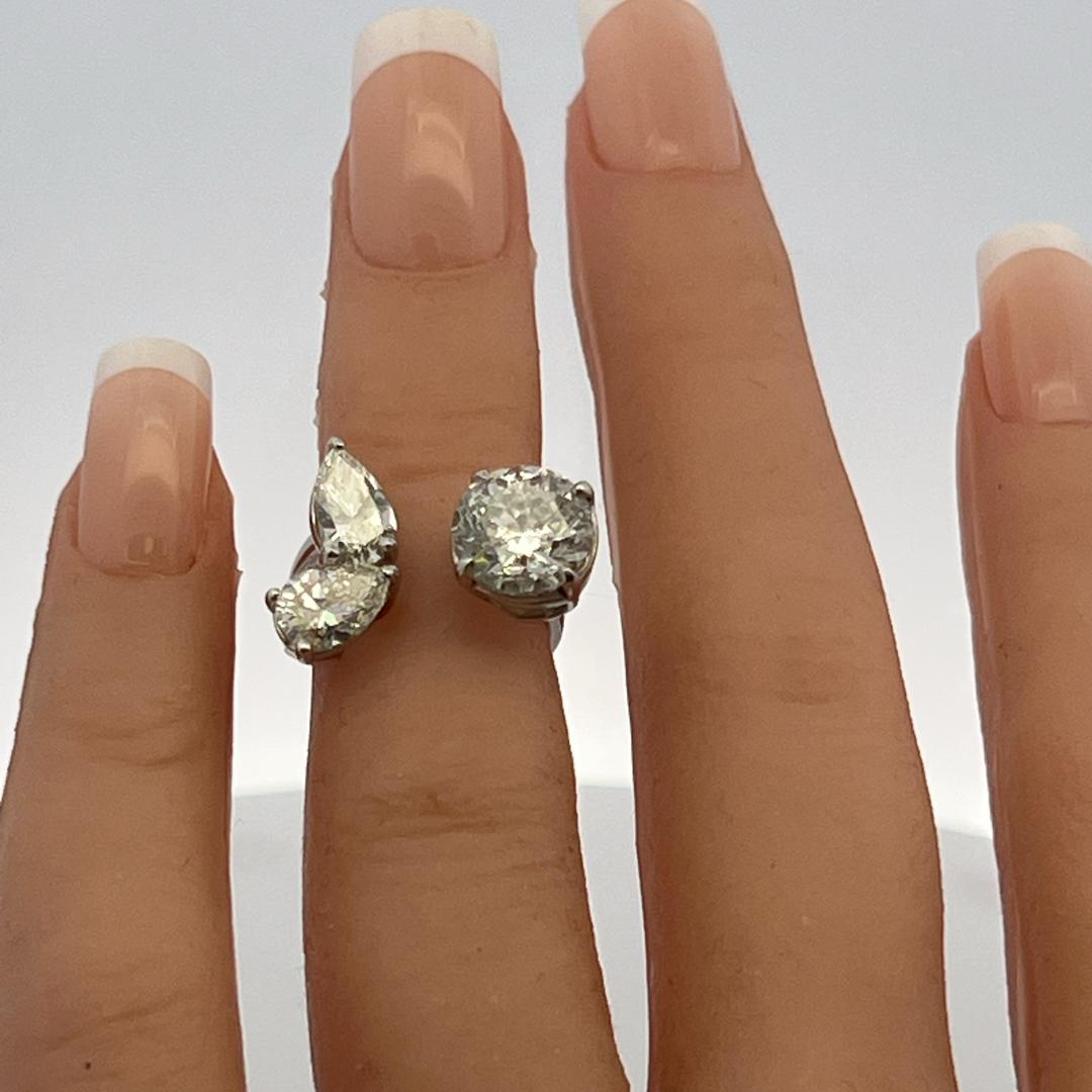 Estate Platinum Three-Stone Cocktail Ring with 3.62 Ct Round & Pear Diamonds GIA