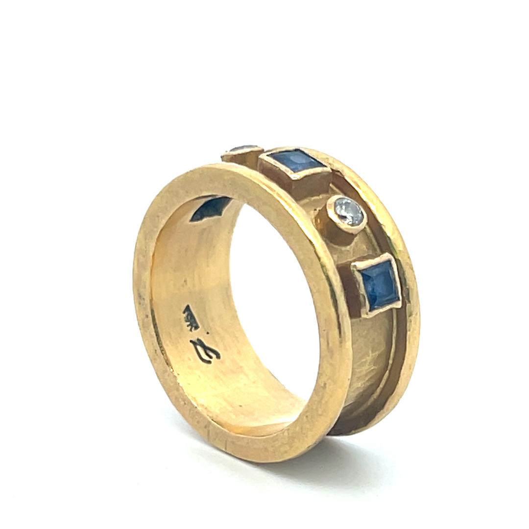 18K YG Band Ring with 0.46 Carat Round Diamonds and 0.36 carat Sapphire Size 7