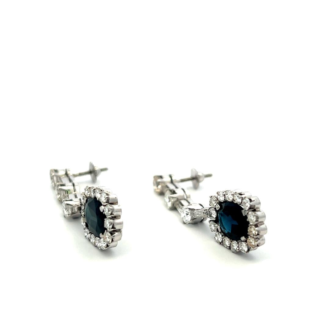 Platinum Drop Earrings with 3.9 Ct Oval Round & Baguette Diamond 4.6 Ct Sapphire