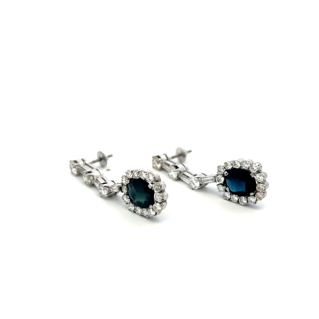 Platinum Drop Earrings with 3.9 Ct Oval Round & Baguette Diamond 4.6 Ct Sapphire