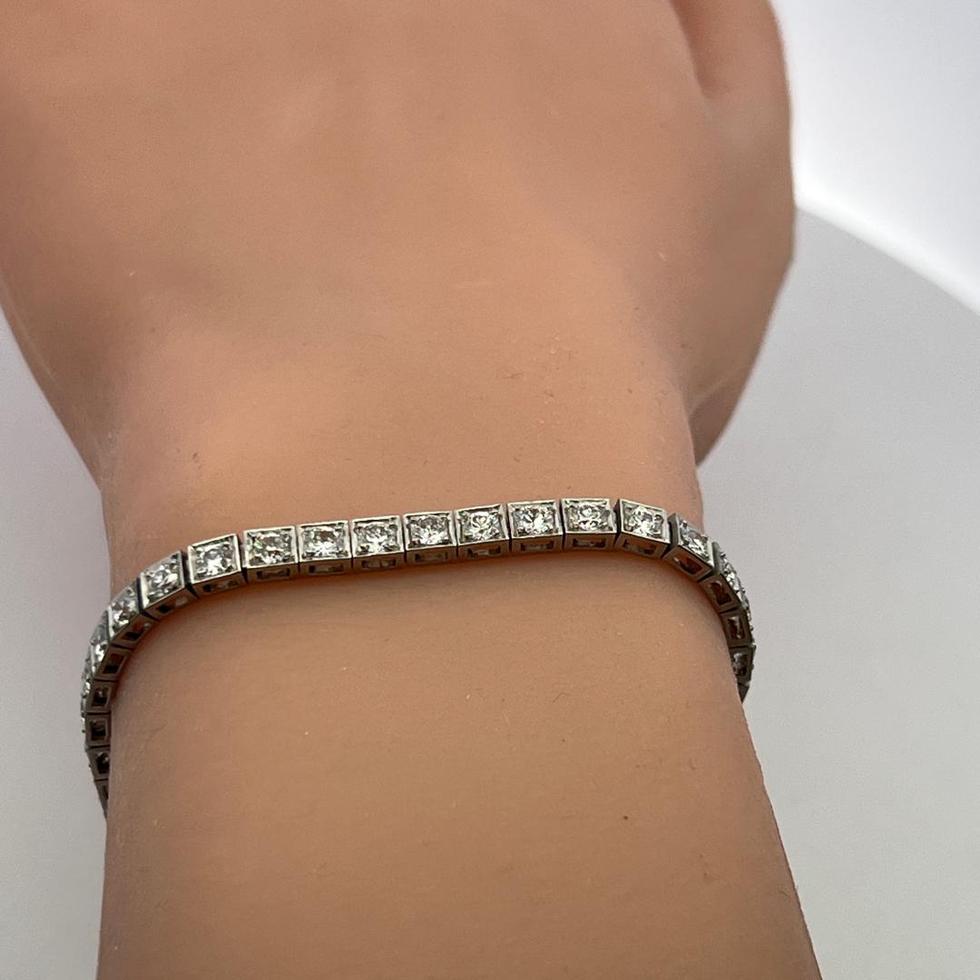 Vintage Platinum Tennis Bracelet with 4.4 Carat Old European Cut F-VS Diamonds