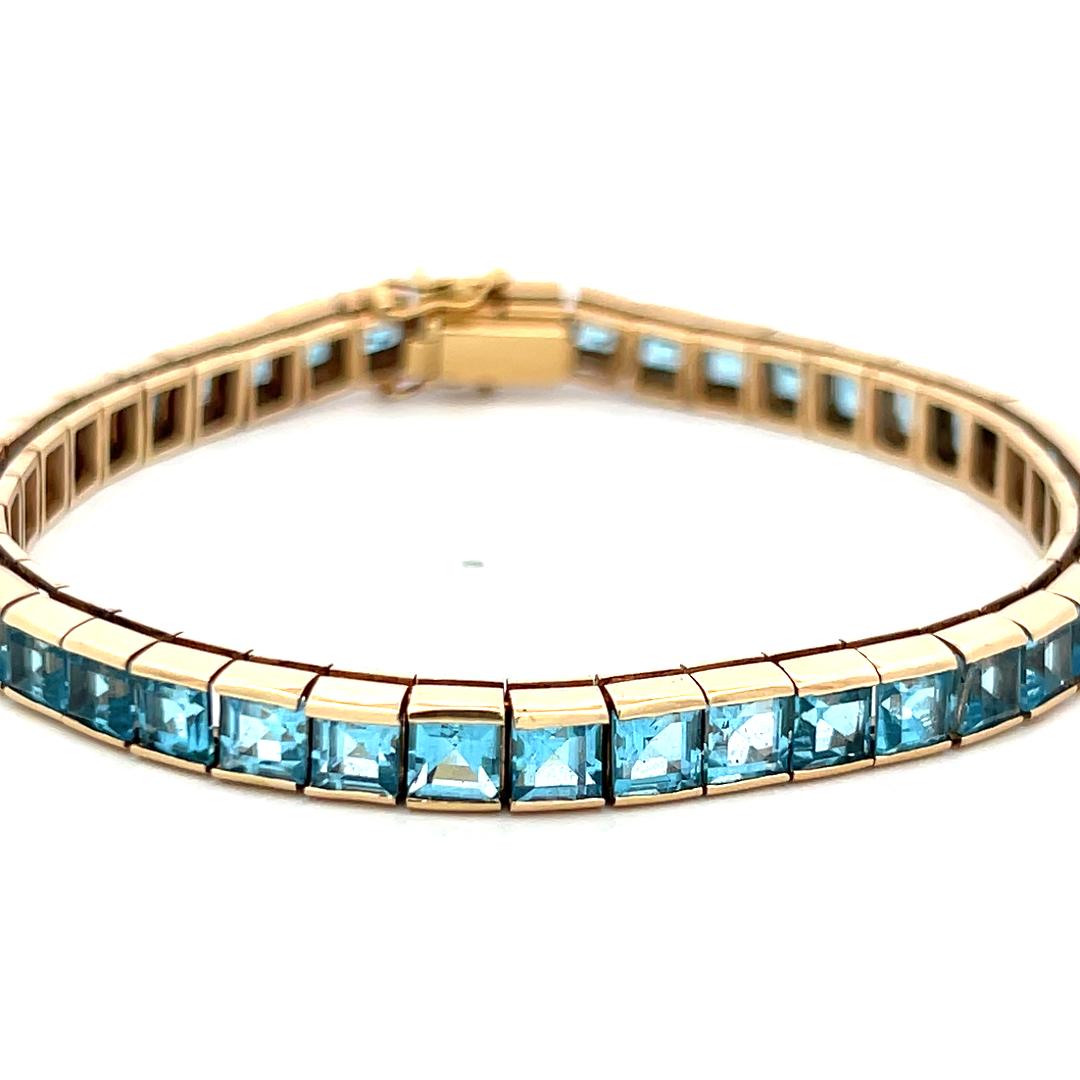 Vintage 14K Yellow Gold Tennis Bracelet with 4.06x3.31 MM Blue Topaz