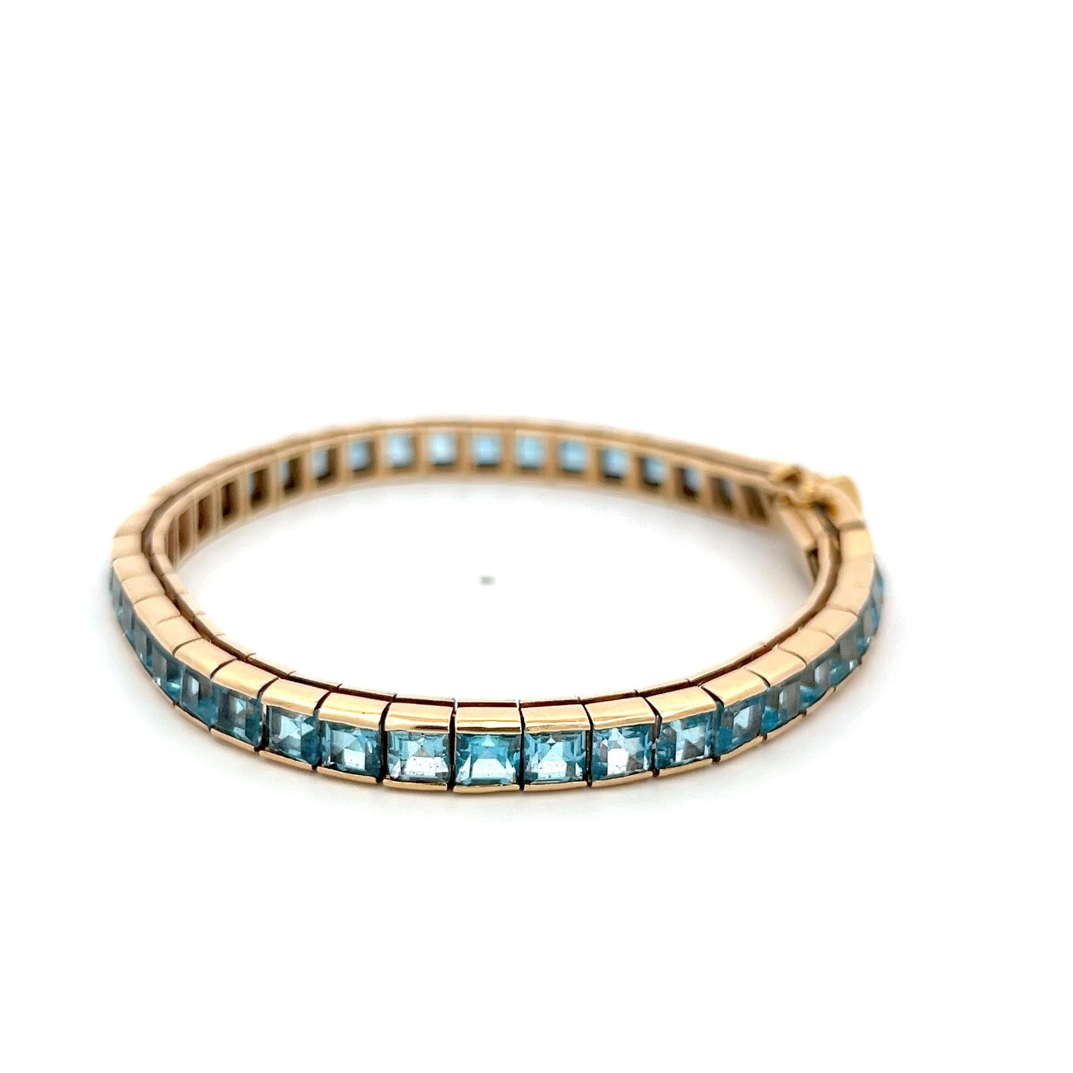 Vintage 14K Yellow Gold Tennis Bracelet with 4.06x3.31 MM Blue Topaz