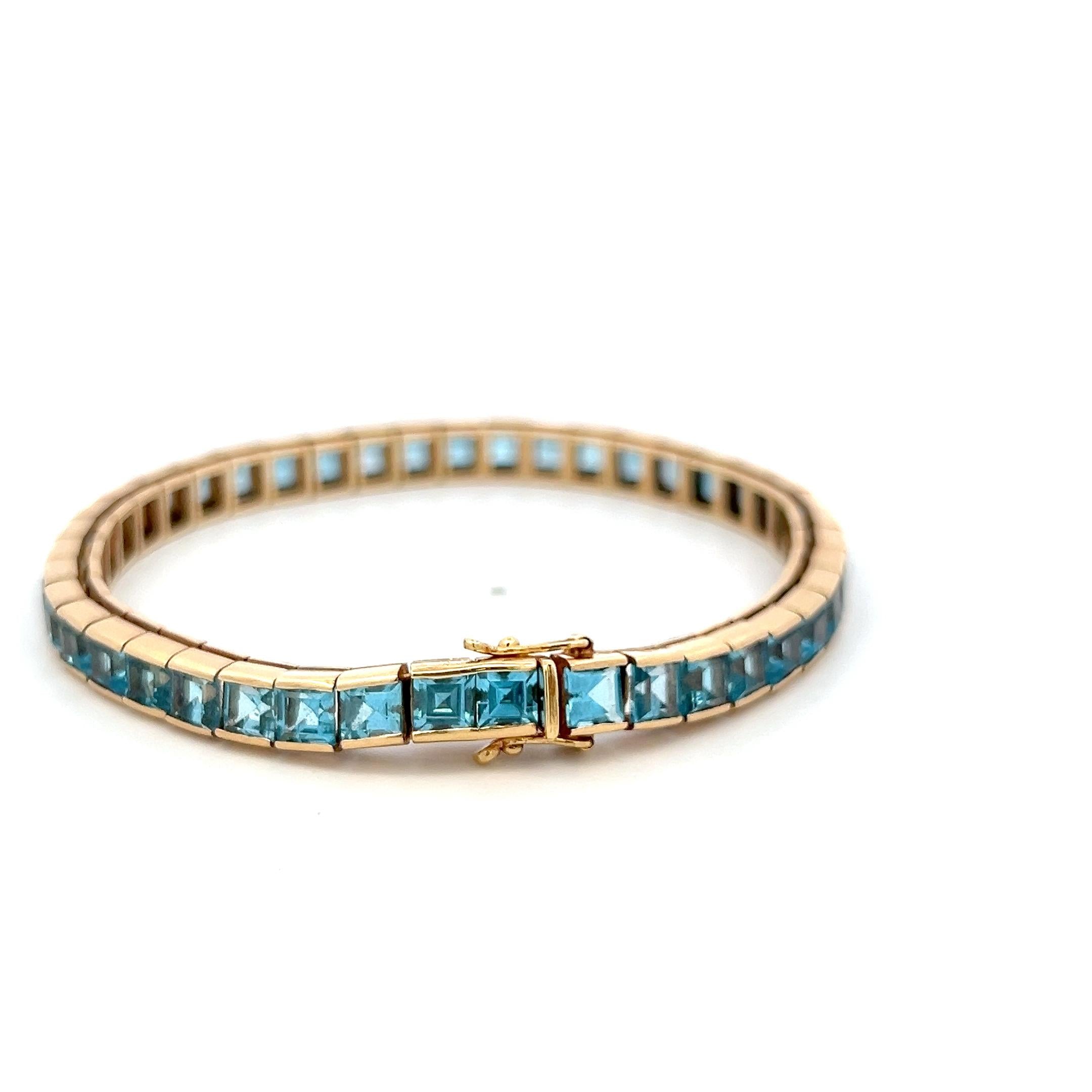 Vintage 14K Yellow Gold Tennis Bracelet with 4.06x3.31 MM Blue Topaz