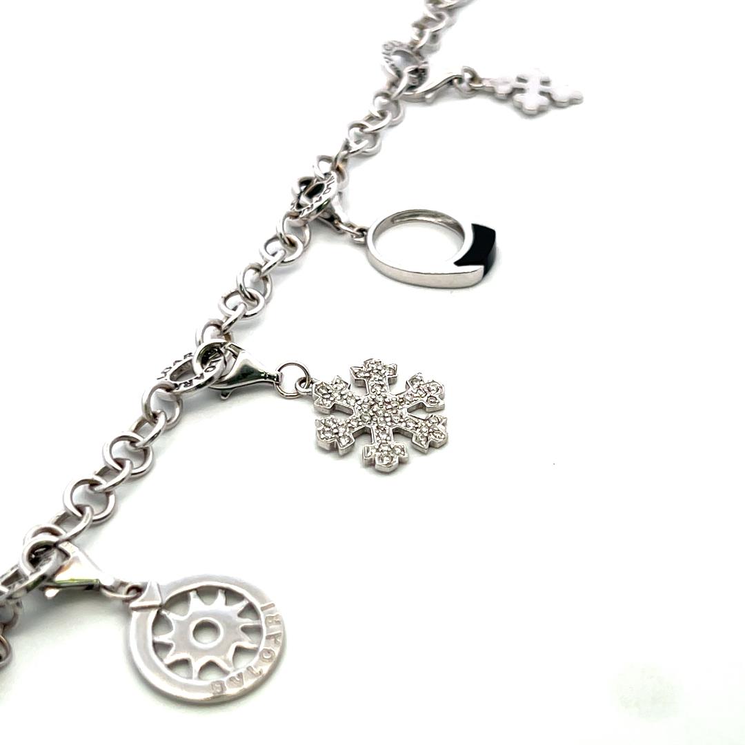 Bvlgari 18K White Gold Charm Bracelet with 0.57 Carat Round H SI Diamonds & Onyx